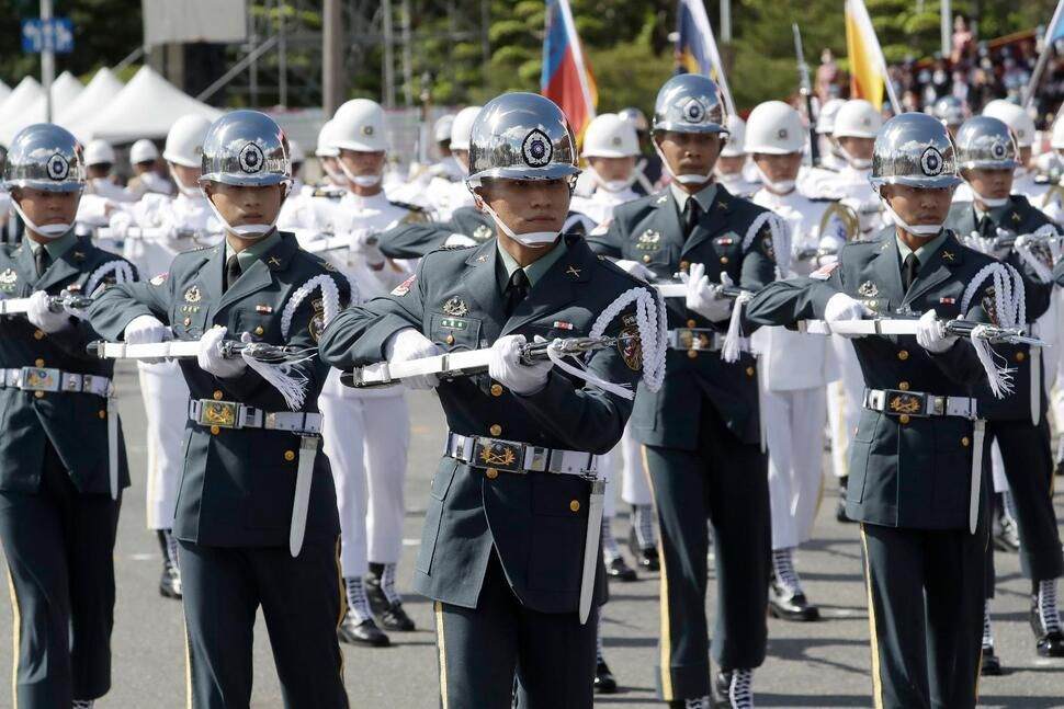 Taiwan says China seeking to degrade its military and morale