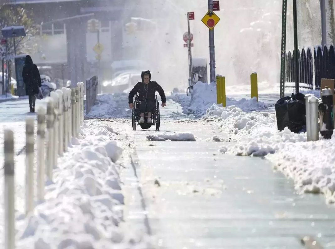 'Bomb cyclone' blankets northeast US in snow